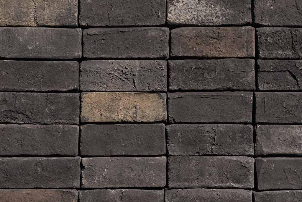 Close up image of Creative Mines Shadowdance Cannery Brick Veneer, highlighting the different color palettes and textures within the collection.